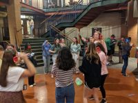 Students in headphones jam in JC