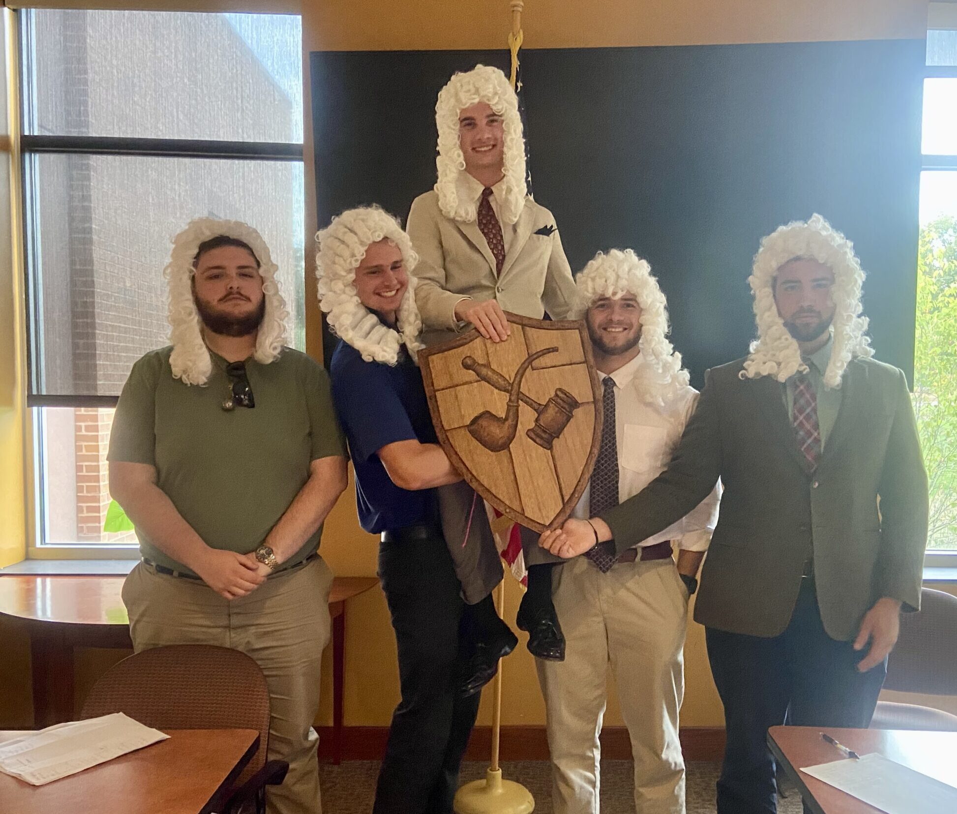 Inside a Men’s Debate Society Meeting 